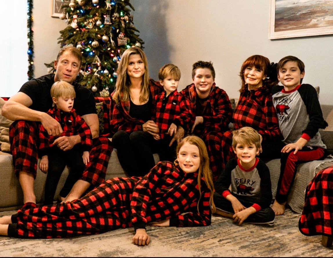 Jennifer and Josiah with their seven children at Christmas
